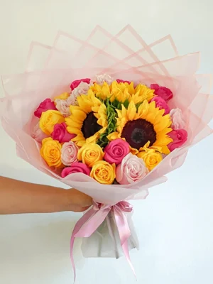 Bouquet de girasoles y rosas en Bogotá con tonos amarillos, ideal para cumpleaños, aniversarios y agradecimientos