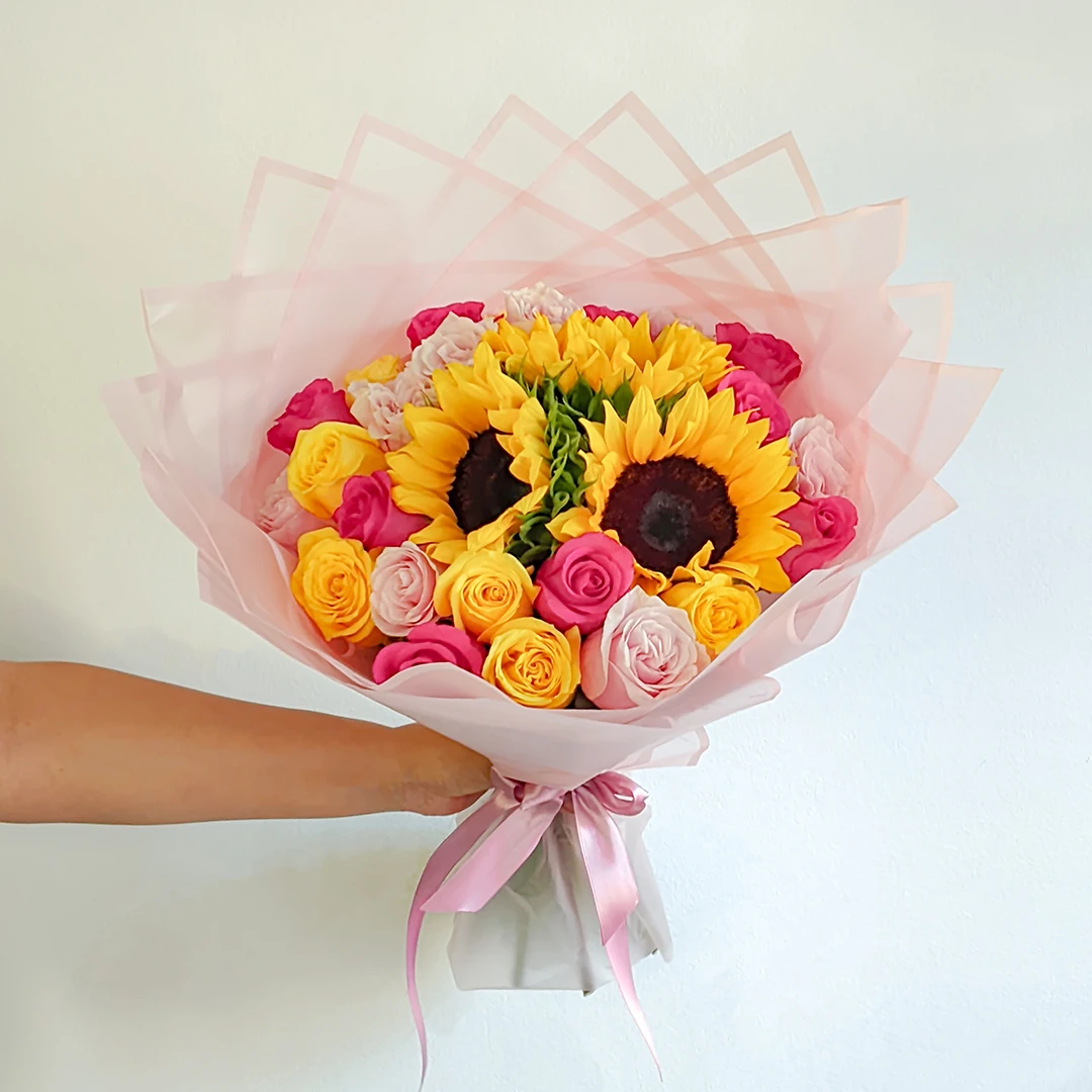 Bouquet de girasoles y rosas en Bogotá con tonos amarillos, ideal para cumpleaños, aniversarios y agradecimientos