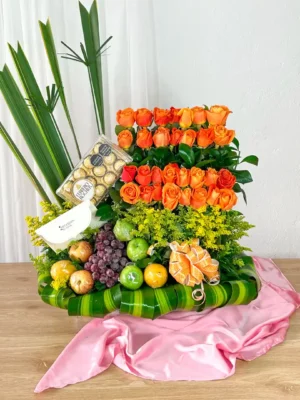 Arreglos florales sencillos rosas naranjas degradé frutas chocolates Ferrero Rocher